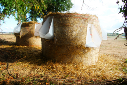 Uritonoirs installed on round straw bales for a wedding in Kergrist in Brittany